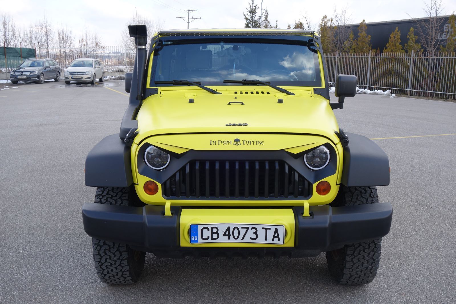 Gul Jeep Wrangler fra 2008