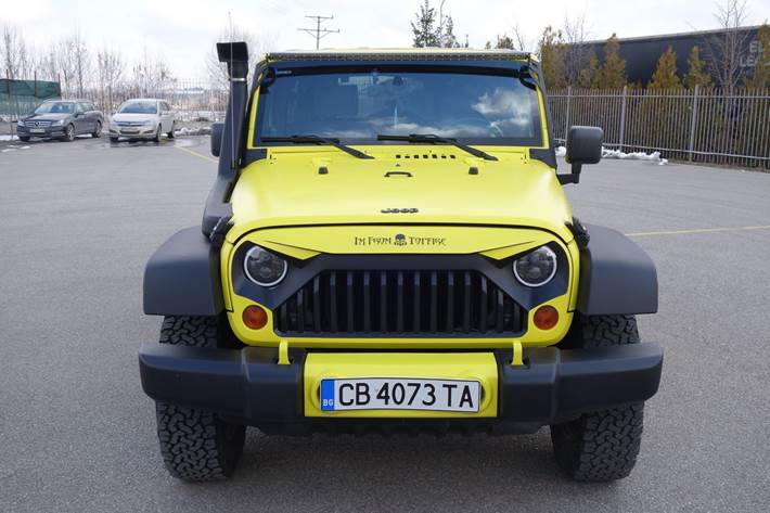 Gul Jeep Wrangler fra 2008