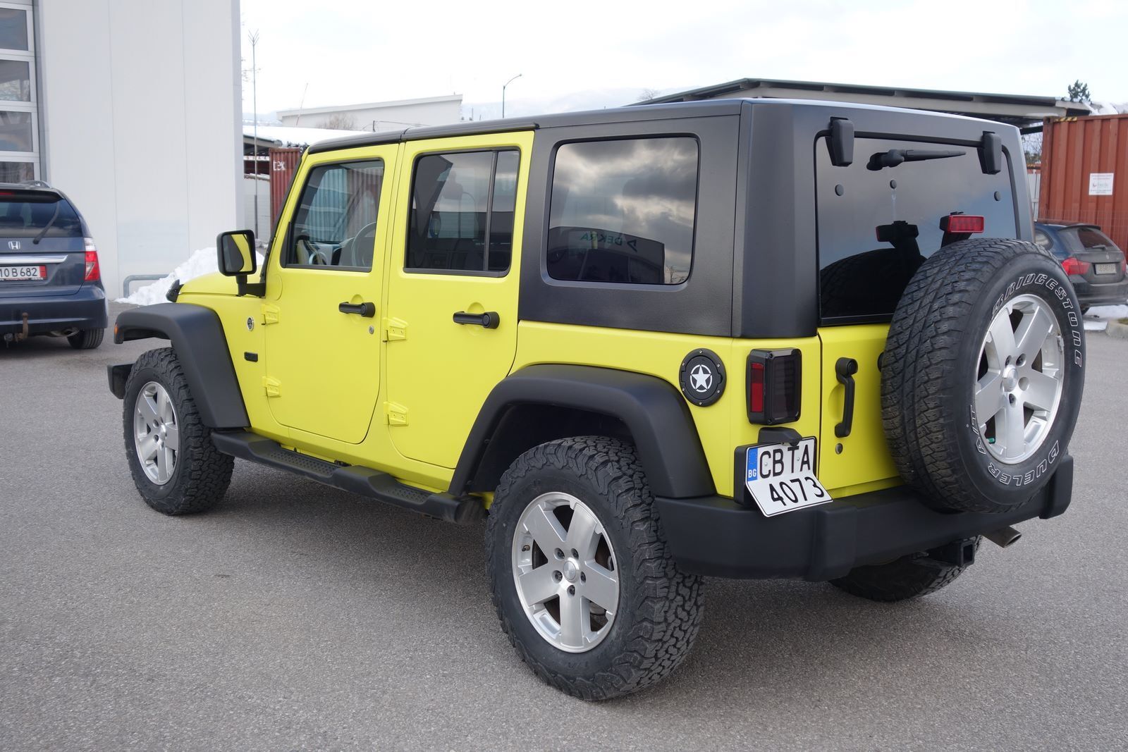 Gul Jeep Wrangler fra 2008