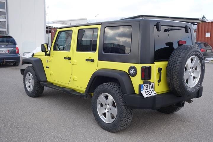 Gul Jeep Wrangler fra 2008