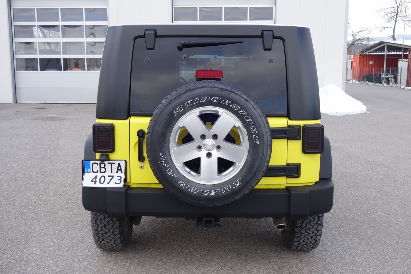 Gul Jeep Wrangler fra 2008