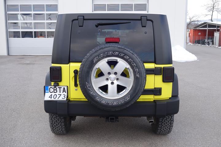Gul Jeep Wrangler fra 2008