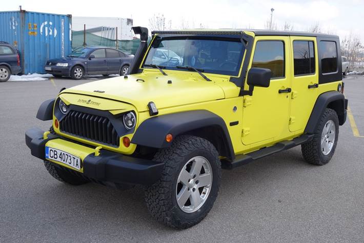 Gul Jeep Wrangler fra 2008