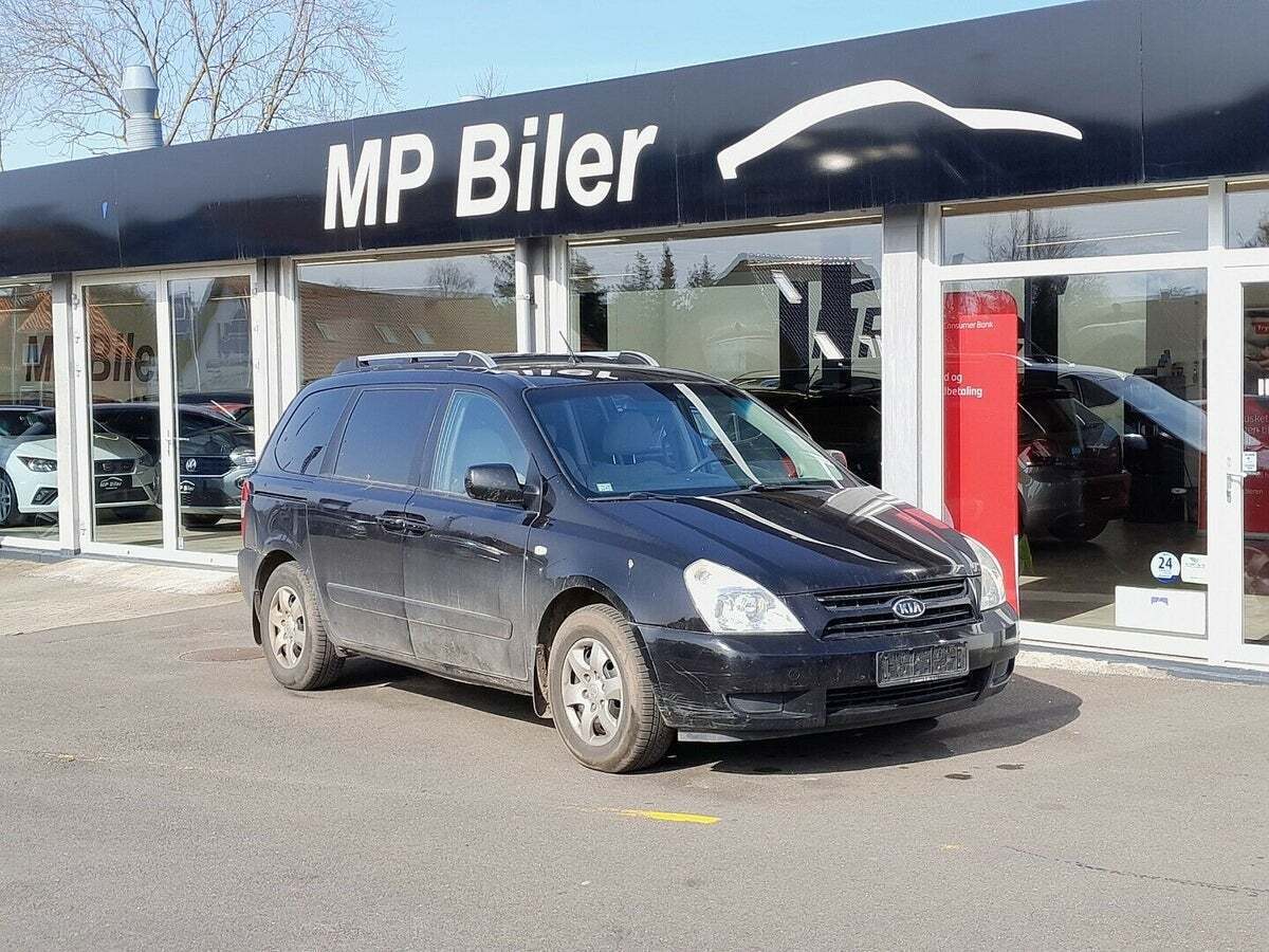 Grå Kia Carnival fra 2007