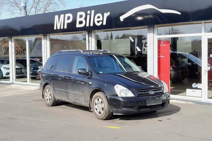 Grå Kia Carnival fra 2007
