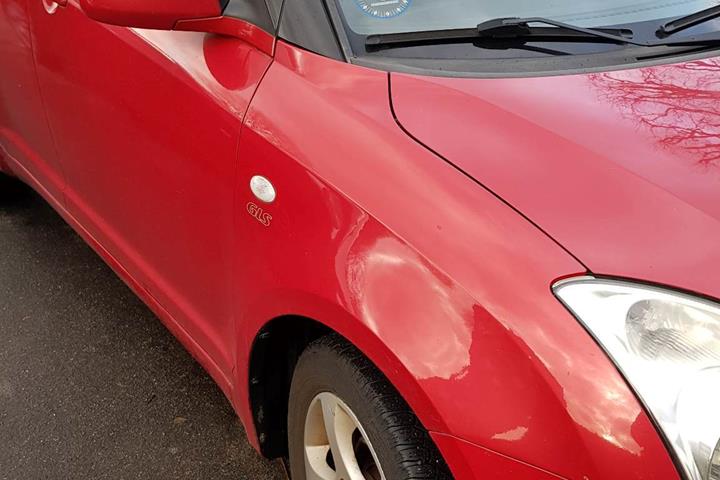 Rød Suzuki Swift fra 2007