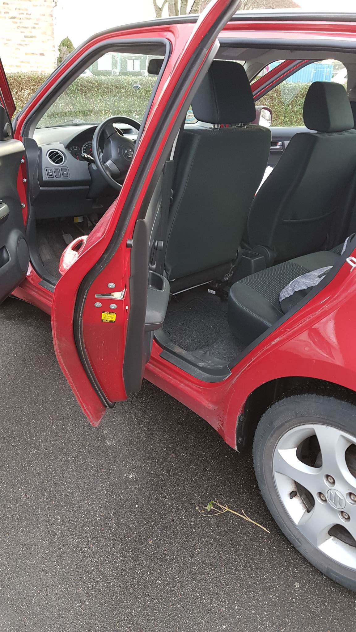 Rød Suzuki Swift fra 2007