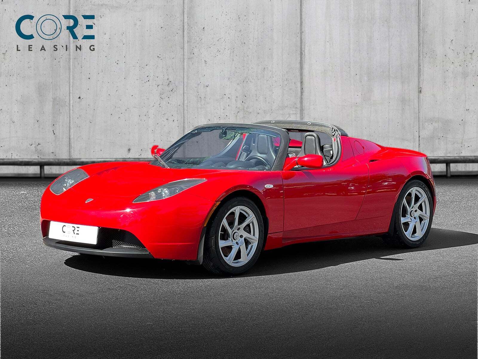 Rød Tesla Roadster fra 2009