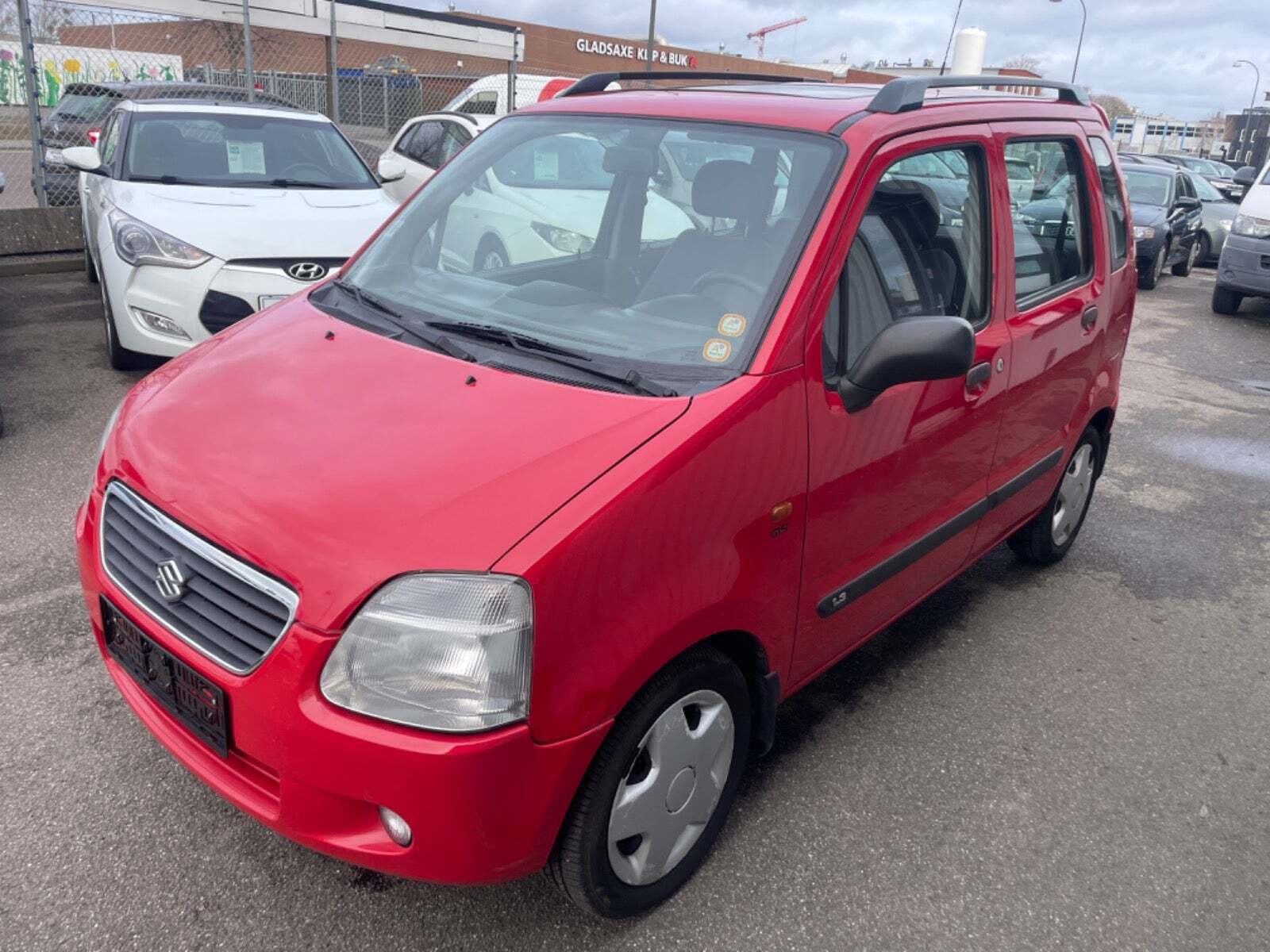 Rød Suzuki Wagon R fra 2003