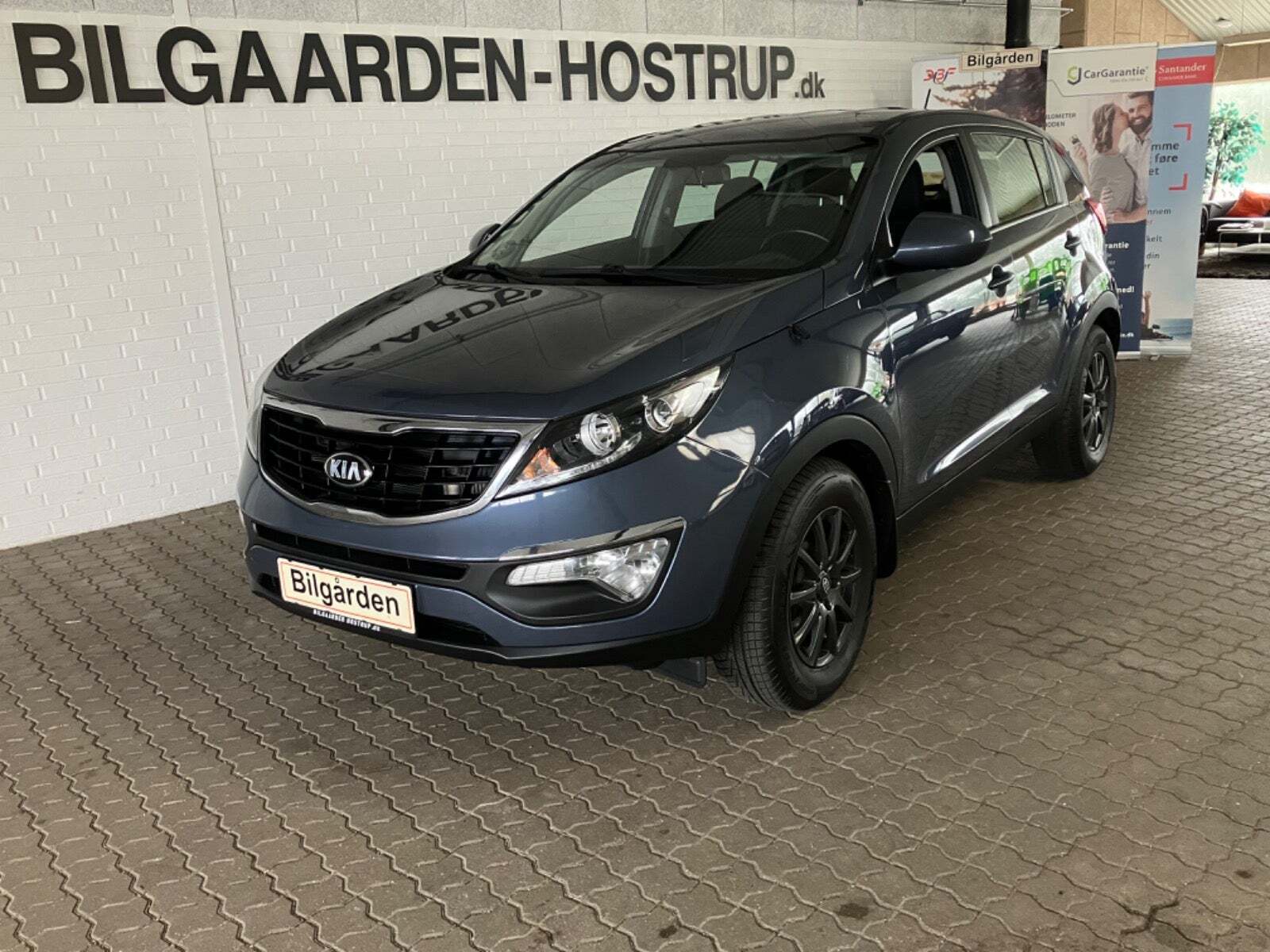 Blå Kia Sportage fra 2014