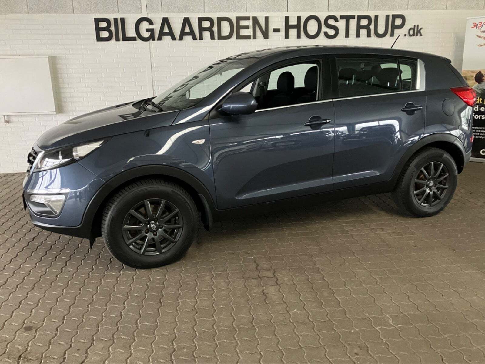Blå Kia Sportage fra 2014