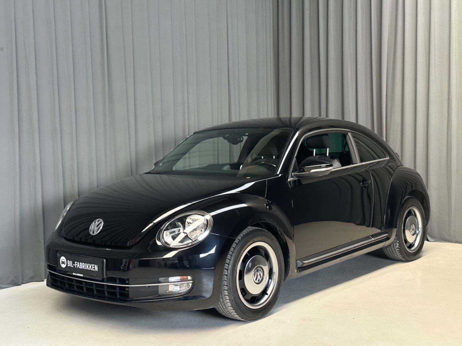 Grå VW The Beetle fra 2013