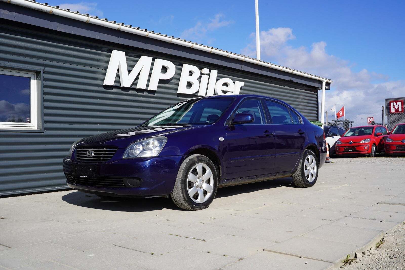 Blå Kia Magentis fra 2008