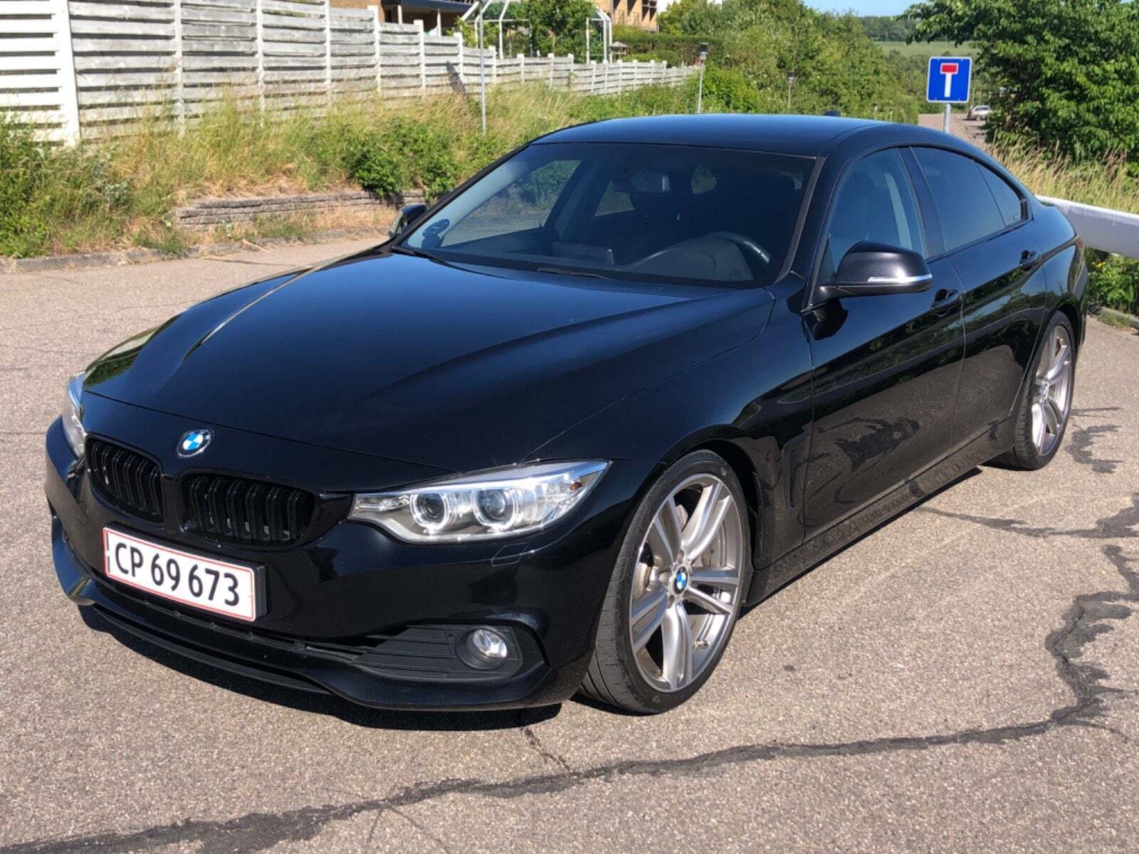 Grå BMW 435i fra 2015
