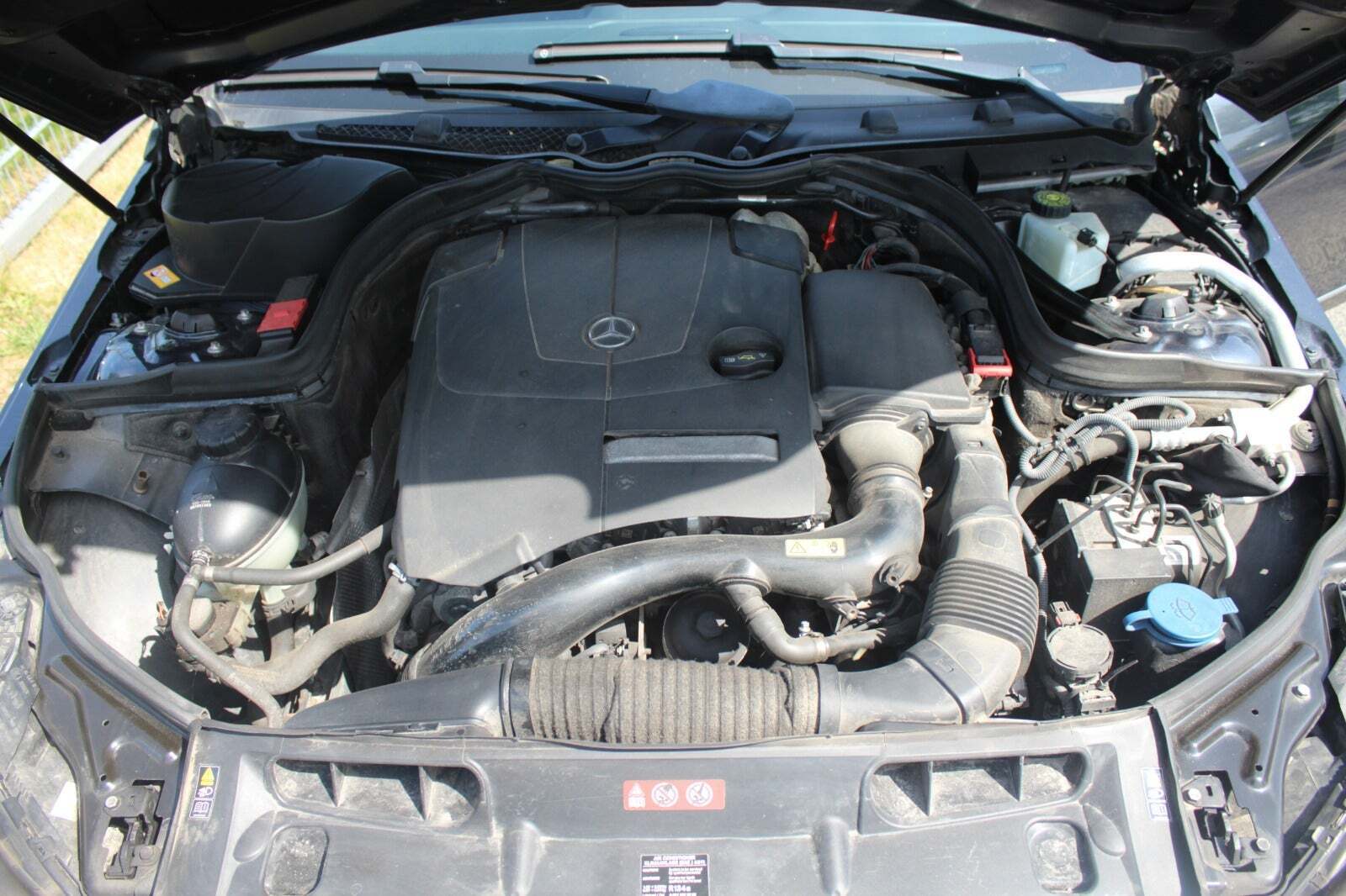 Grå Mercedes C180 fra 2013