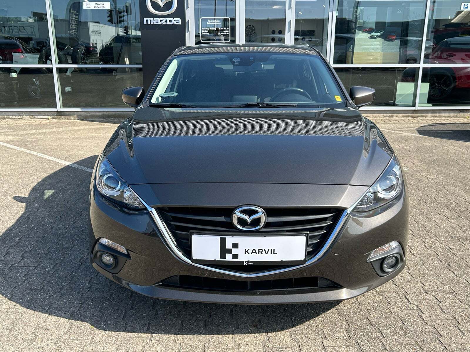 Brun Mazda 3 fra 2015