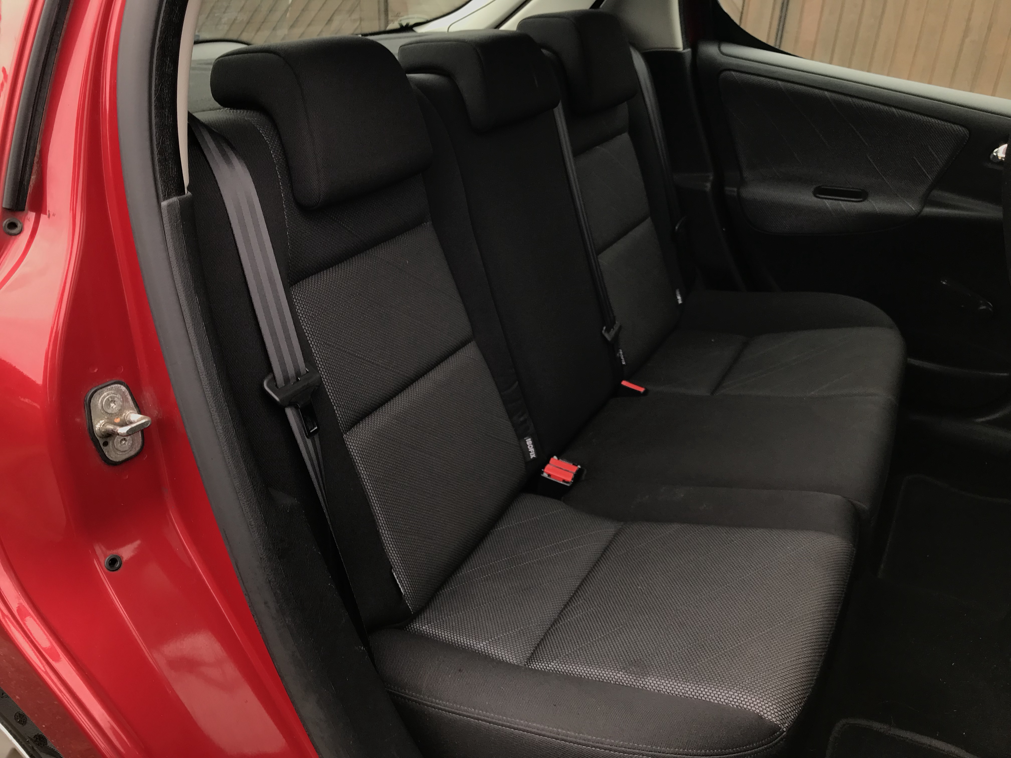 Rød Peugeot 207 fra 2008