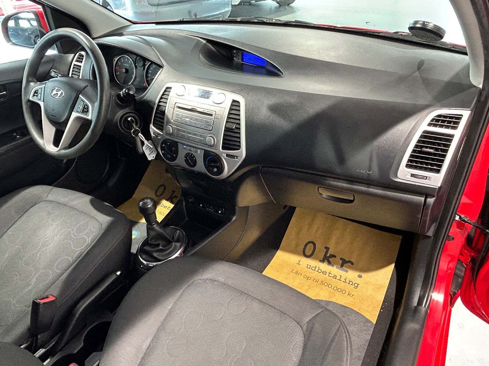 Rød Hyundai i20 fra 2012