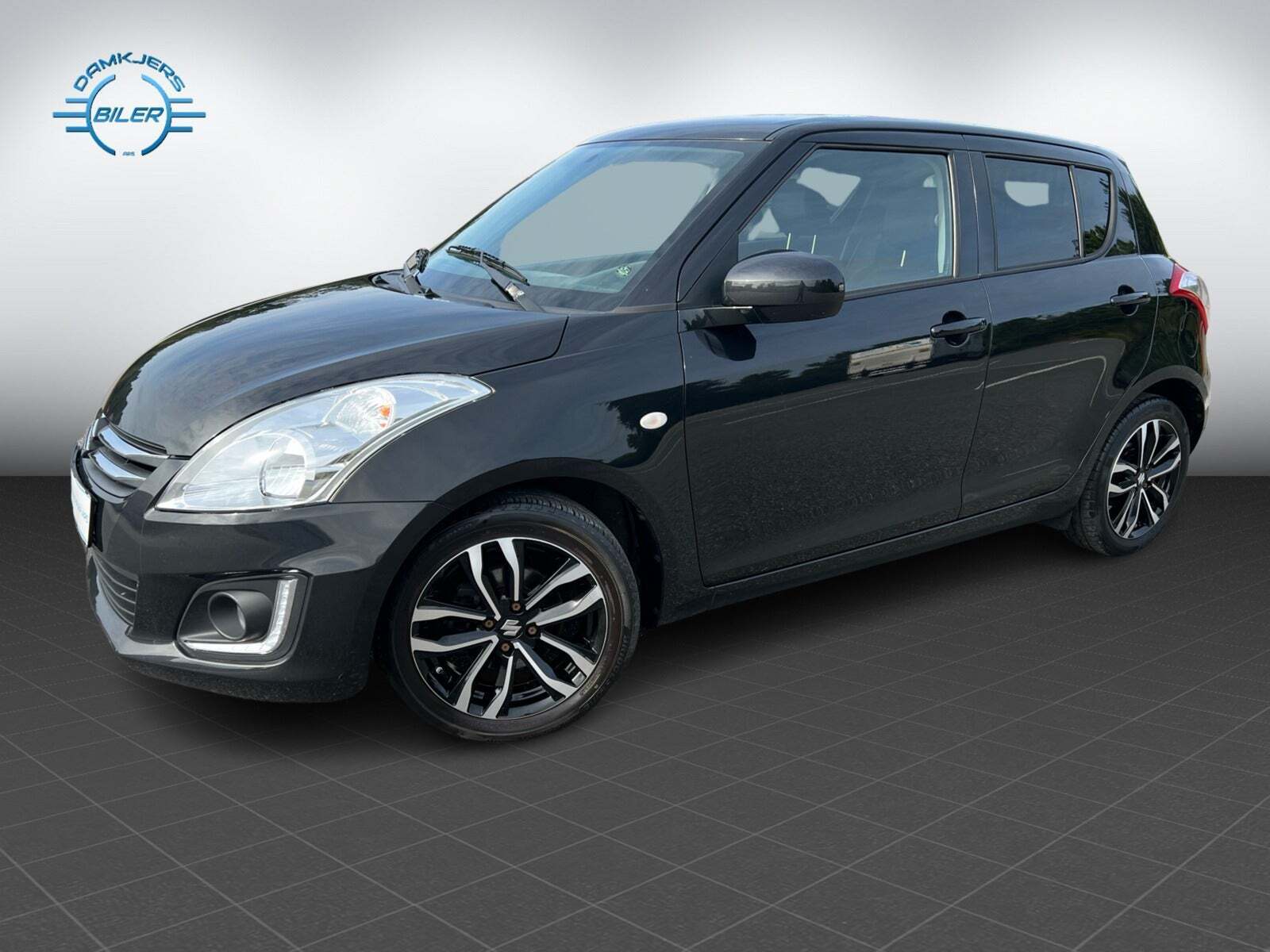 Grå Suzuki Swift fra 2015