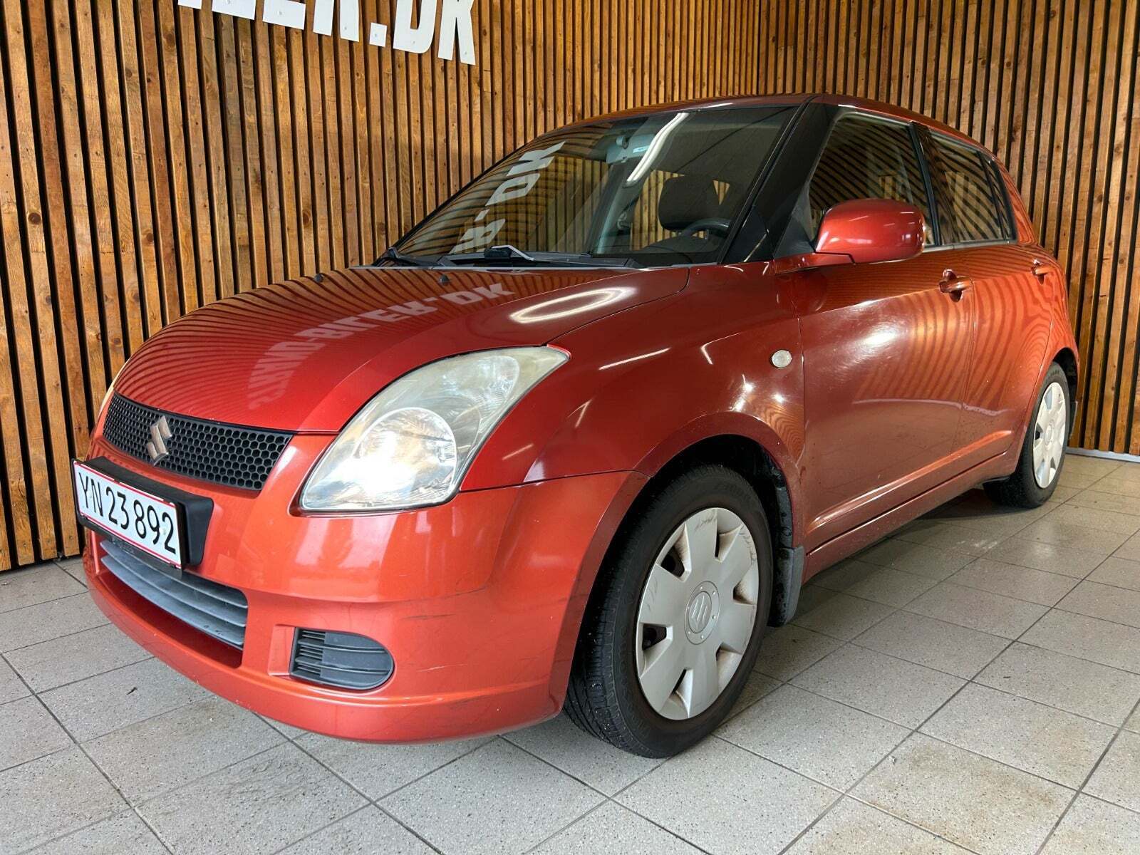 Orange Suzuki Swift fra 2007