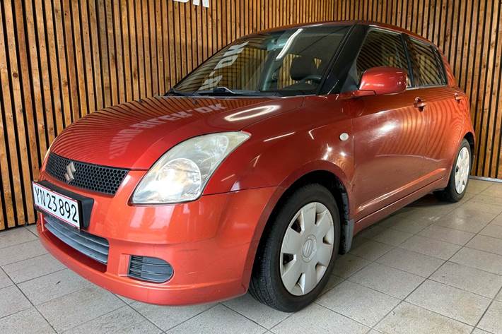 Orange Suzuki Swift fra 2007