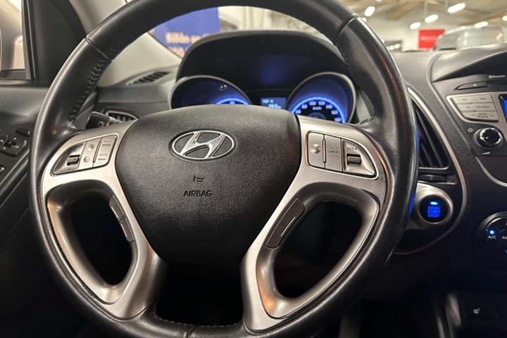 Orange Hyundai ix35 fra 2010 set indefra