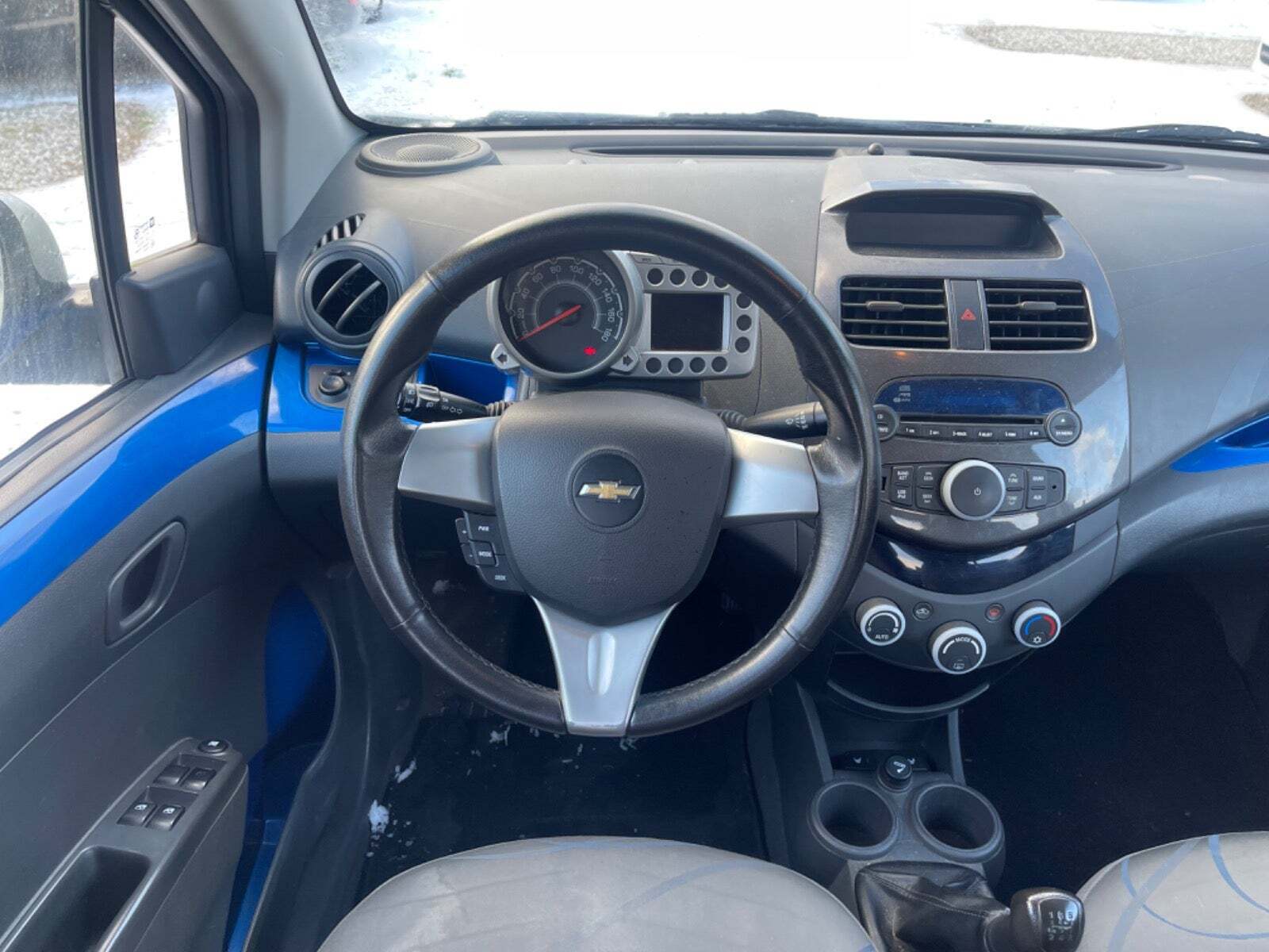 Sølv Chevrolet Spark fra 2012