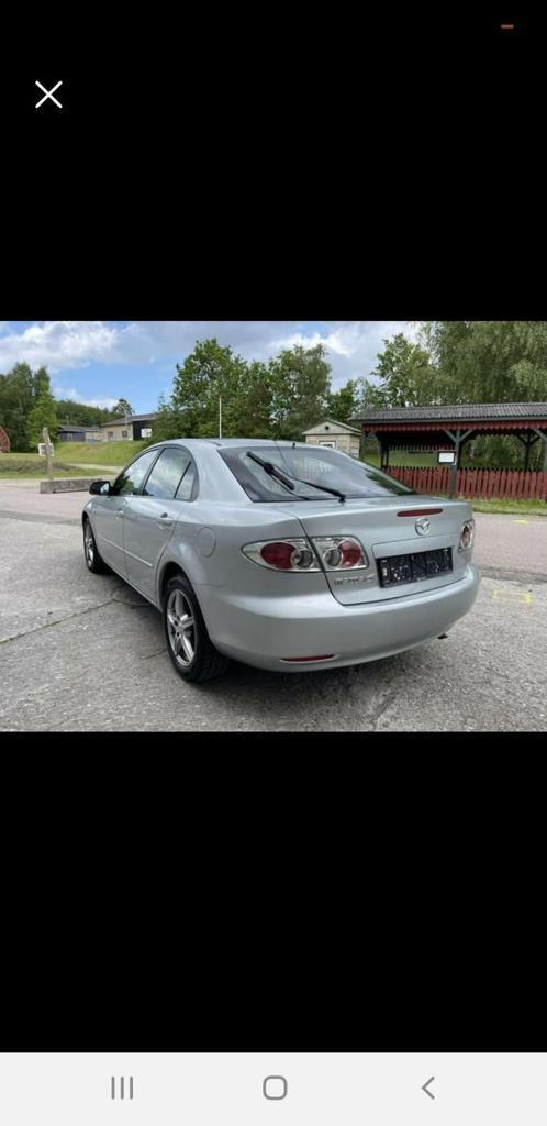 Sølv Mazda 6 fra 2004