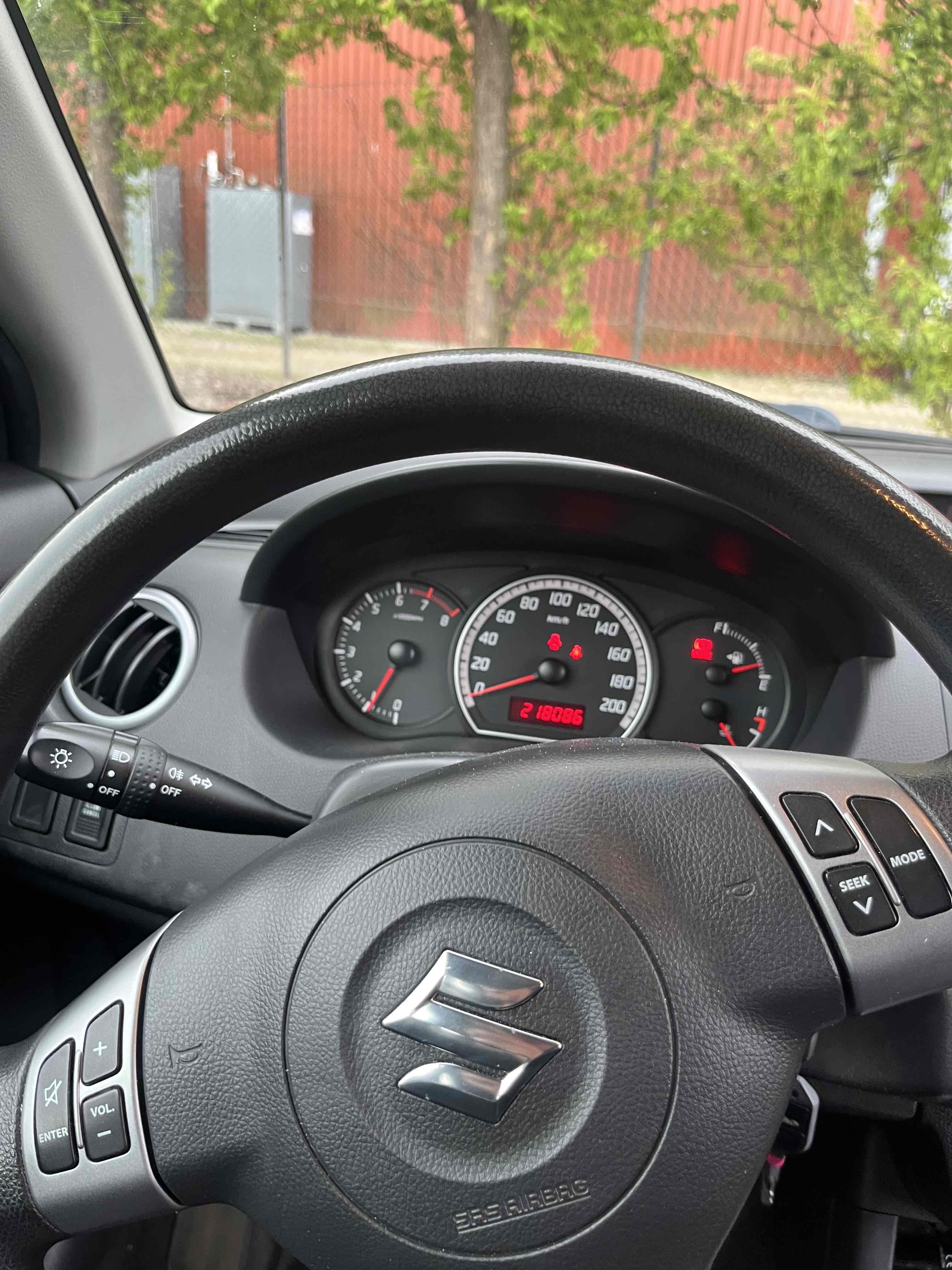Grå Suzuki Swift fra 2005