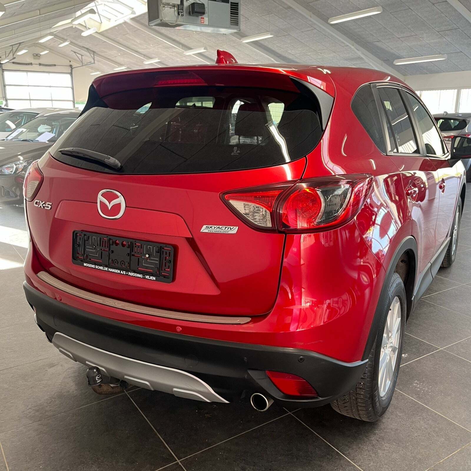 Rød Mazda CX-5 fra 2013 set udefra