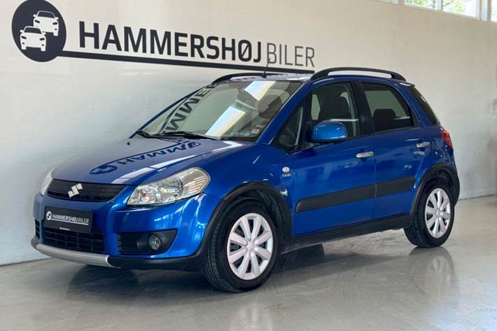 Blå Suzuki SX4 fra 2009