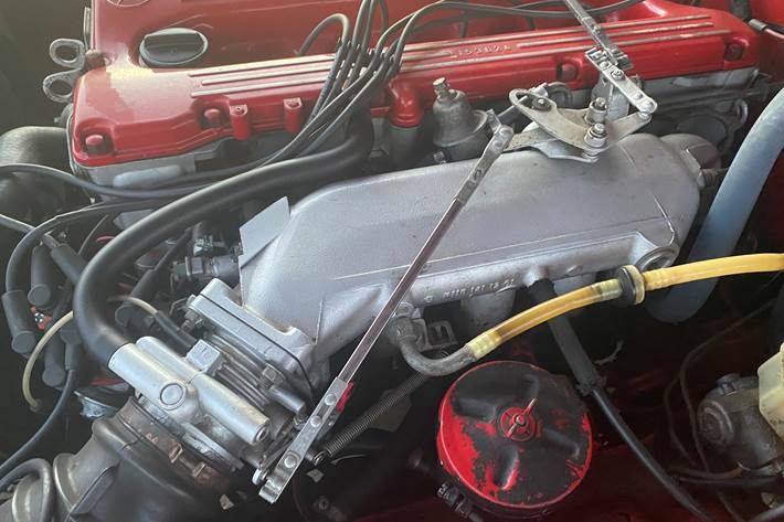 Rød Mercedes 280 SL fra 1975