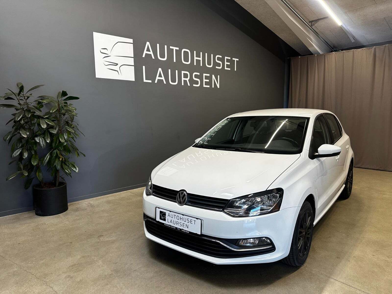 Gul VW Polo fra 2014