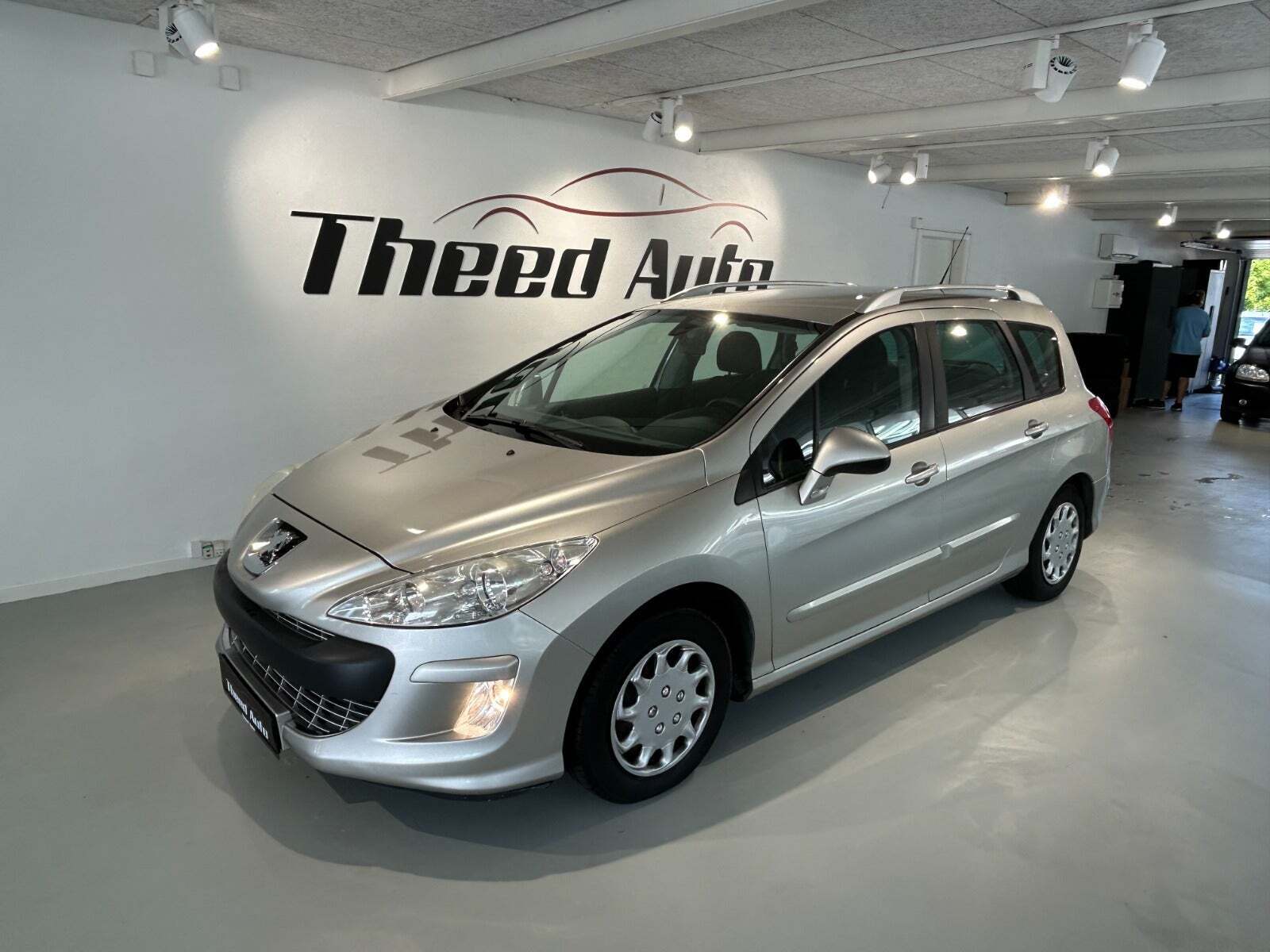 Sølv Peugeot 308 fra 2009