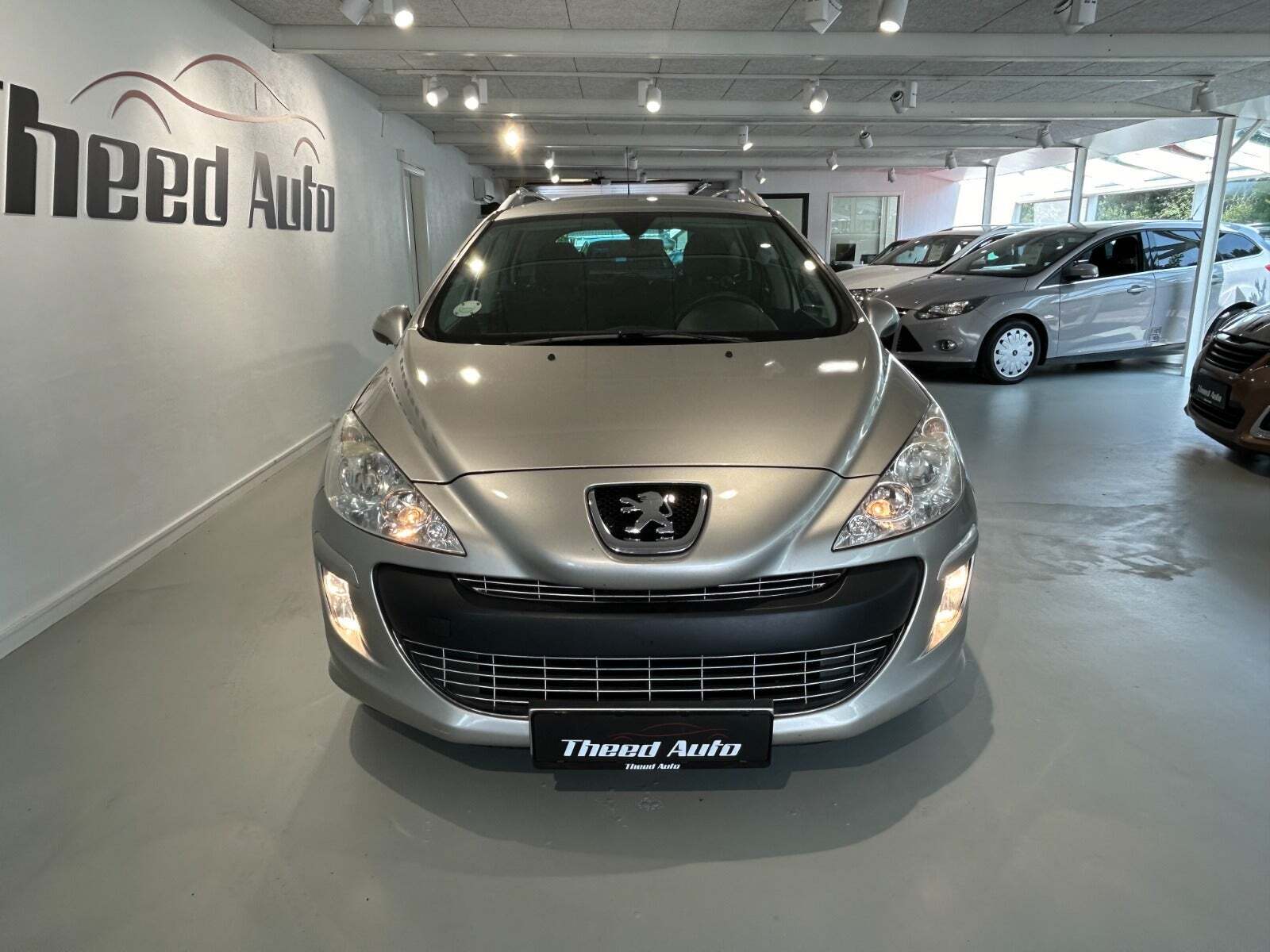 Sølv Peugeot 308 fra 2009