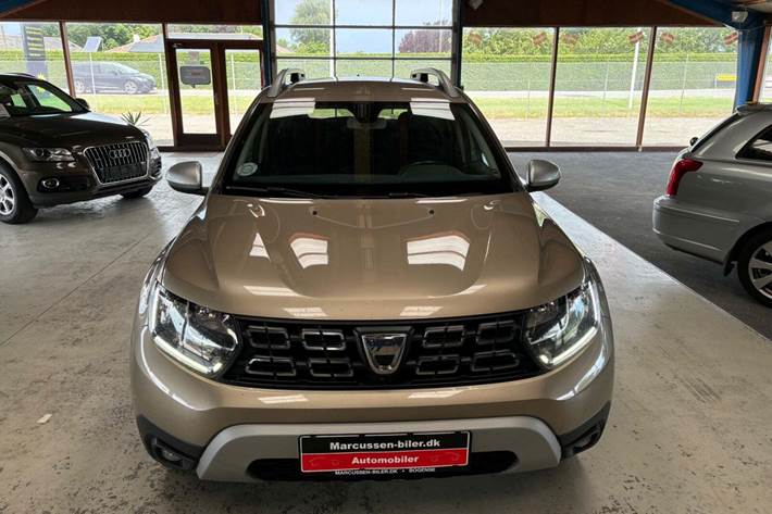 Orange Dacia Duster fra 2018