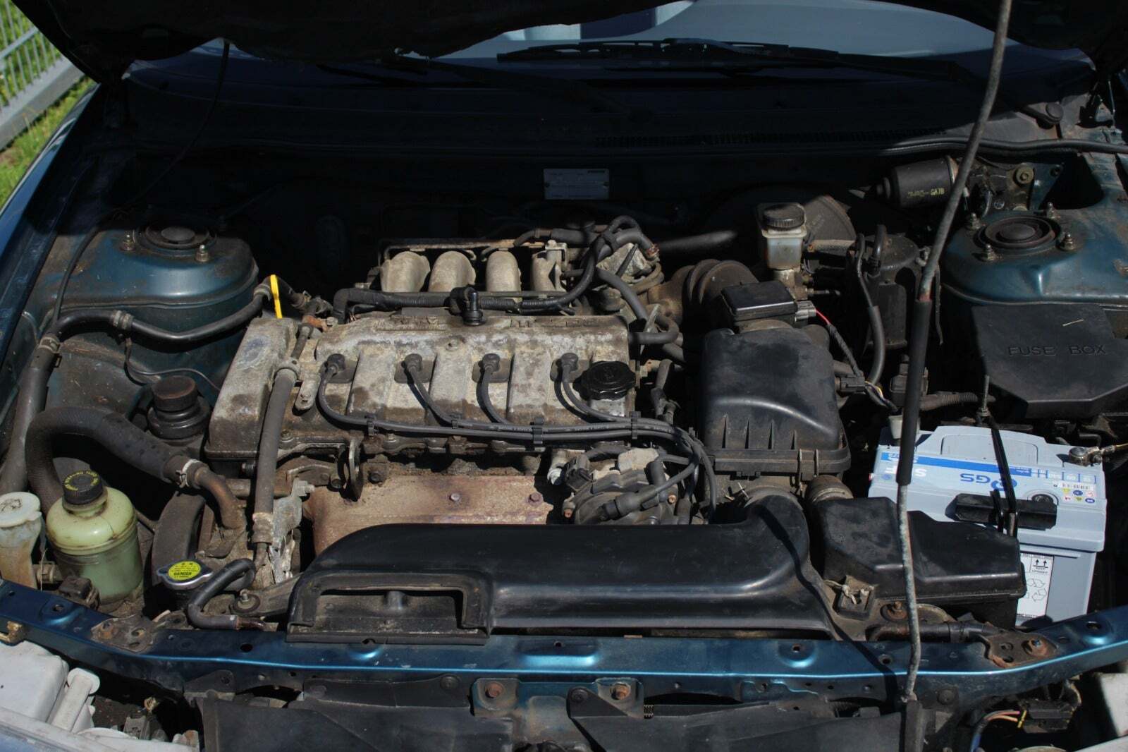 Grøn Mazda 626 fra 1992