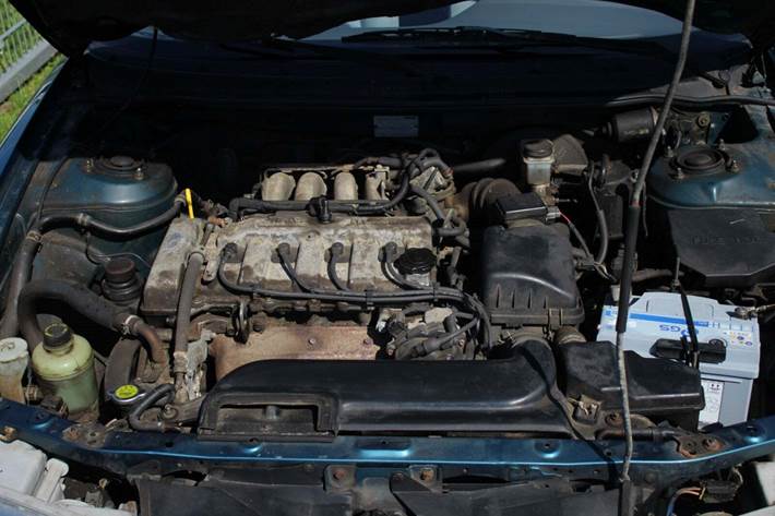 Grøn Mazda 626 fra 1992