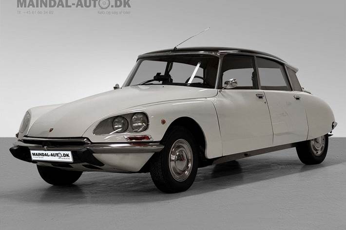 Gul Citroën DS19 fra 1974 set udefra