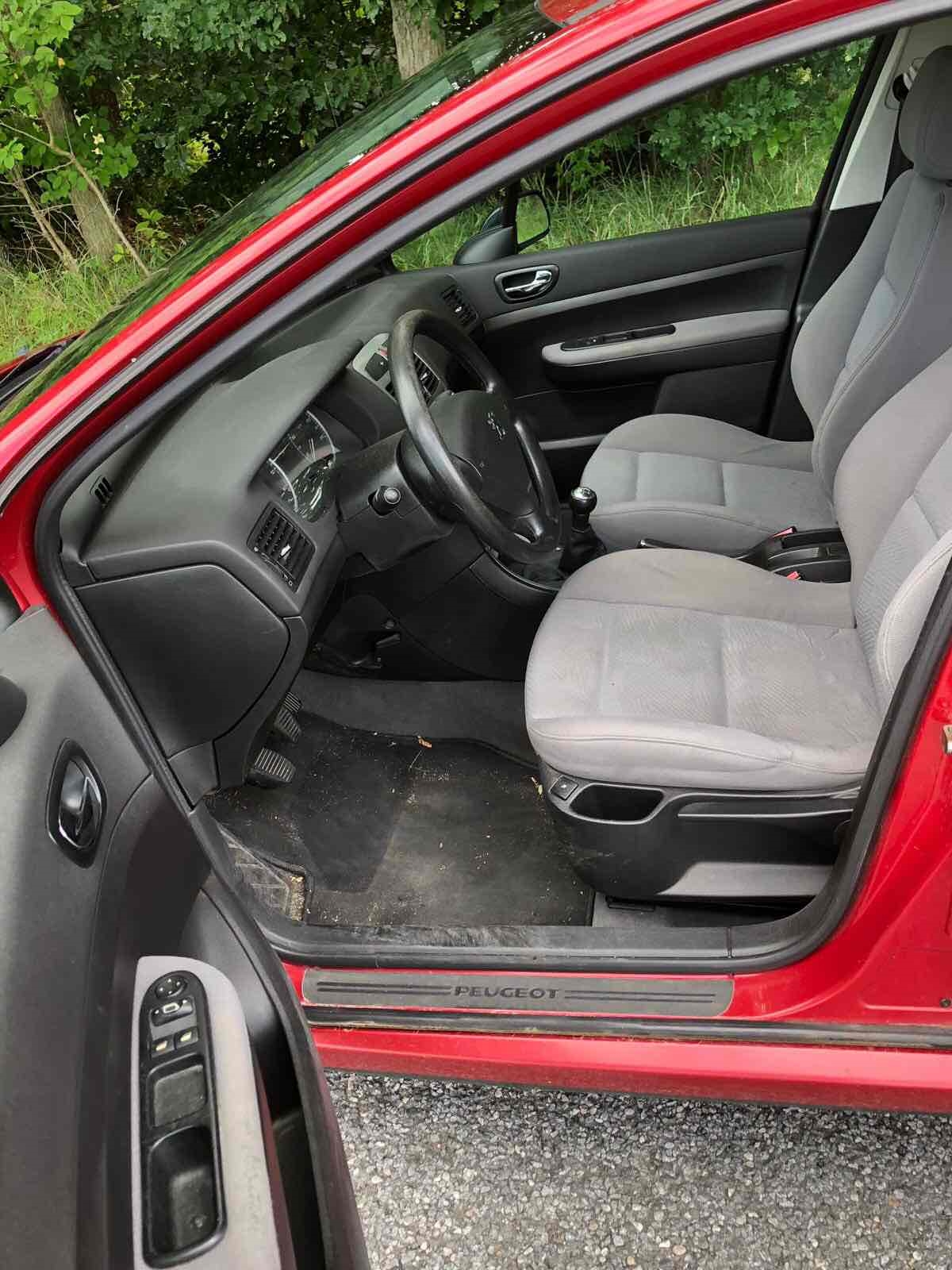 Rød Peugeot 307 fra 2003