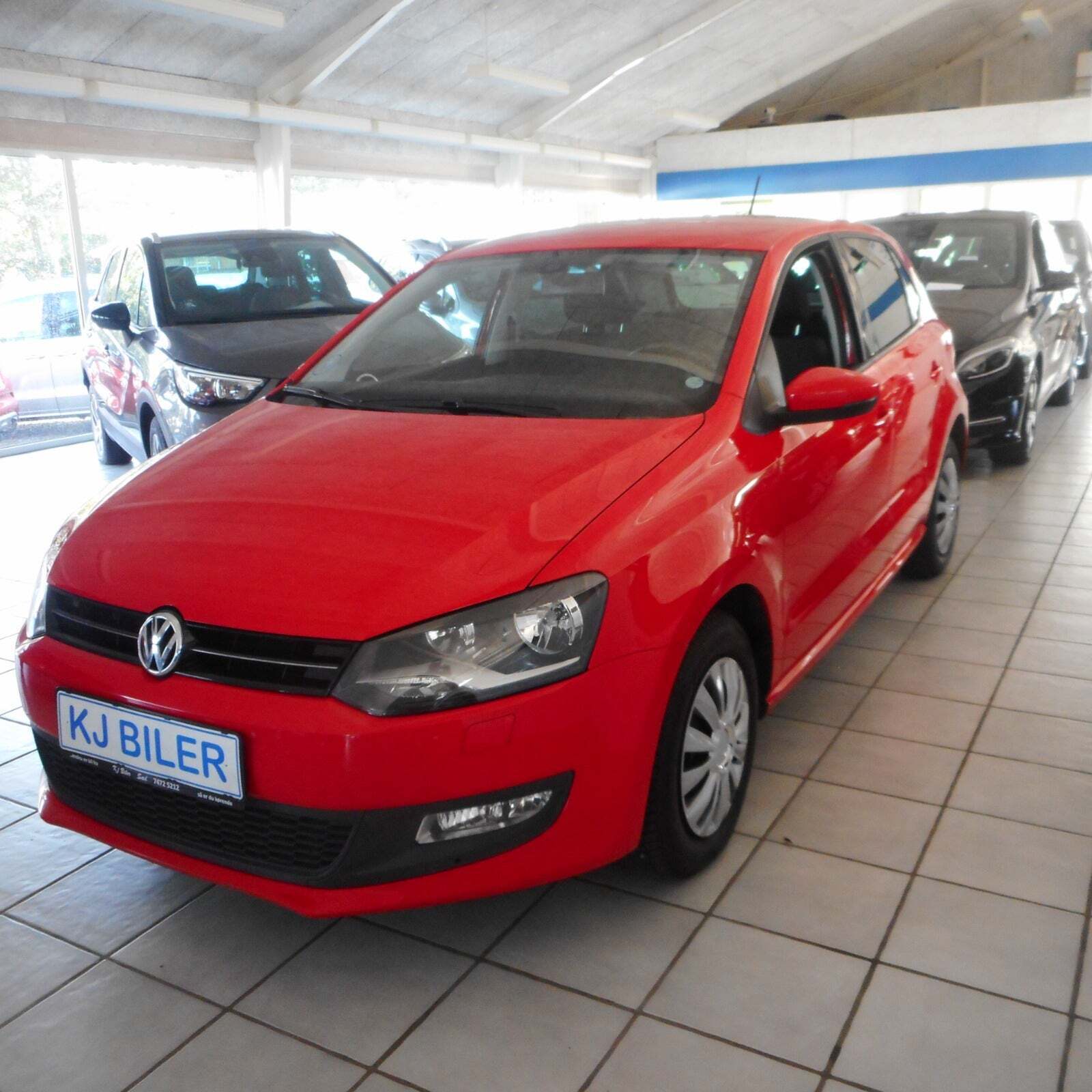 Rød VW Polo fra 2013