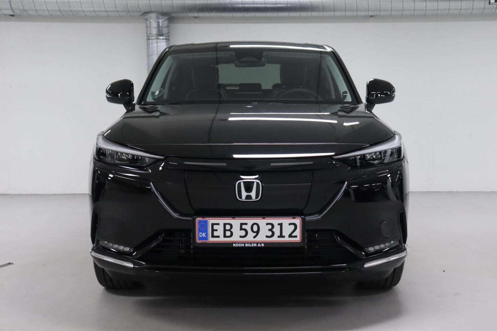 Sort Honda e:Ny1 fra 2023 set udefra