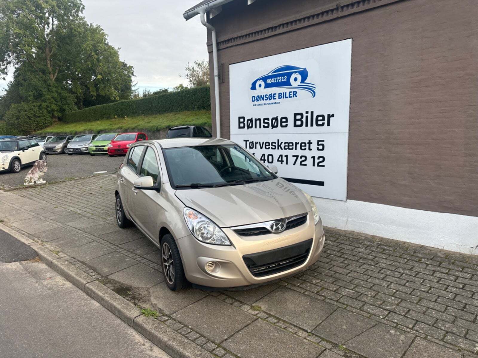 Orange Hyundai i20 fra 2012