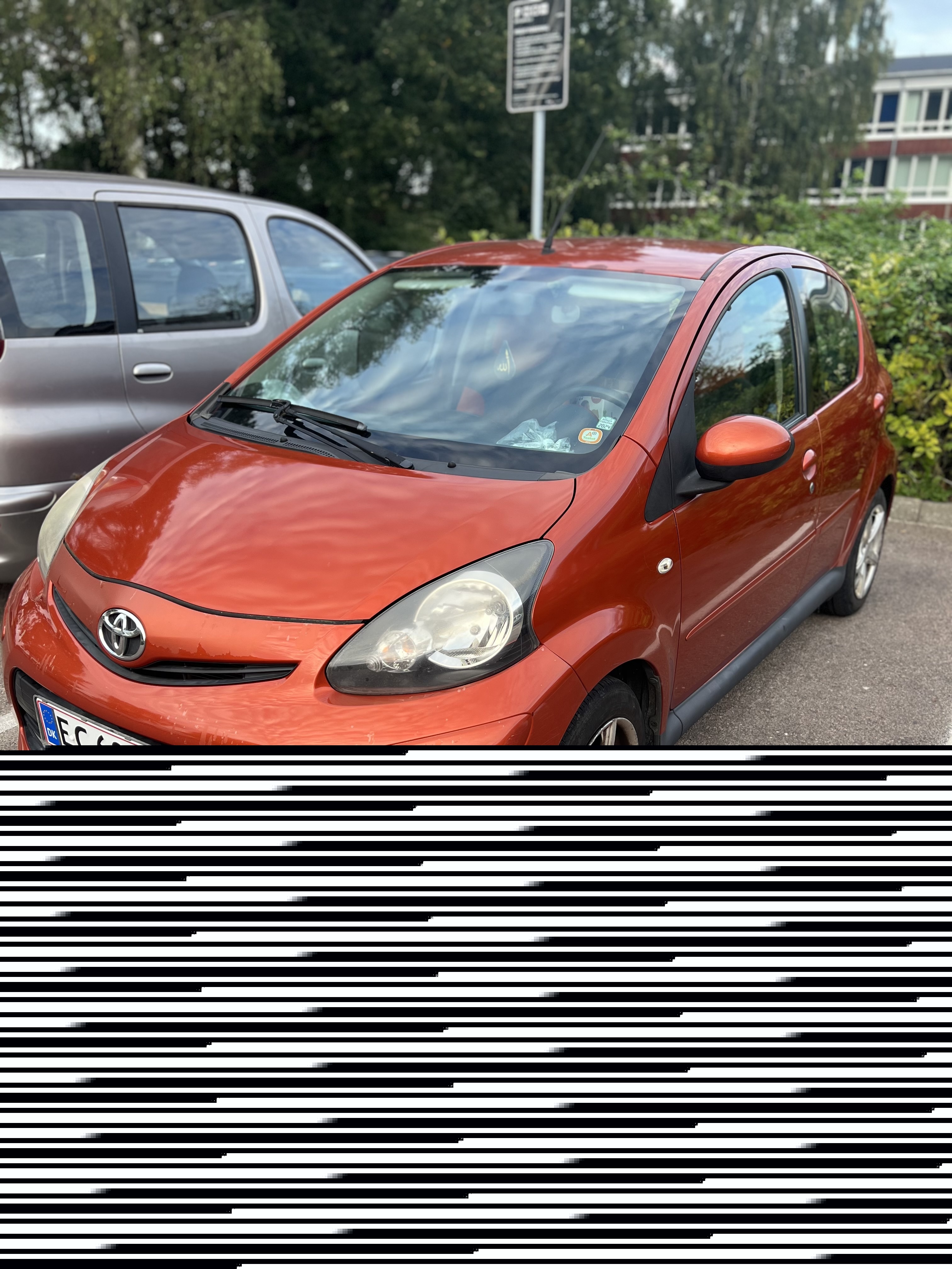 Brun Toyota Aygo fra 2012