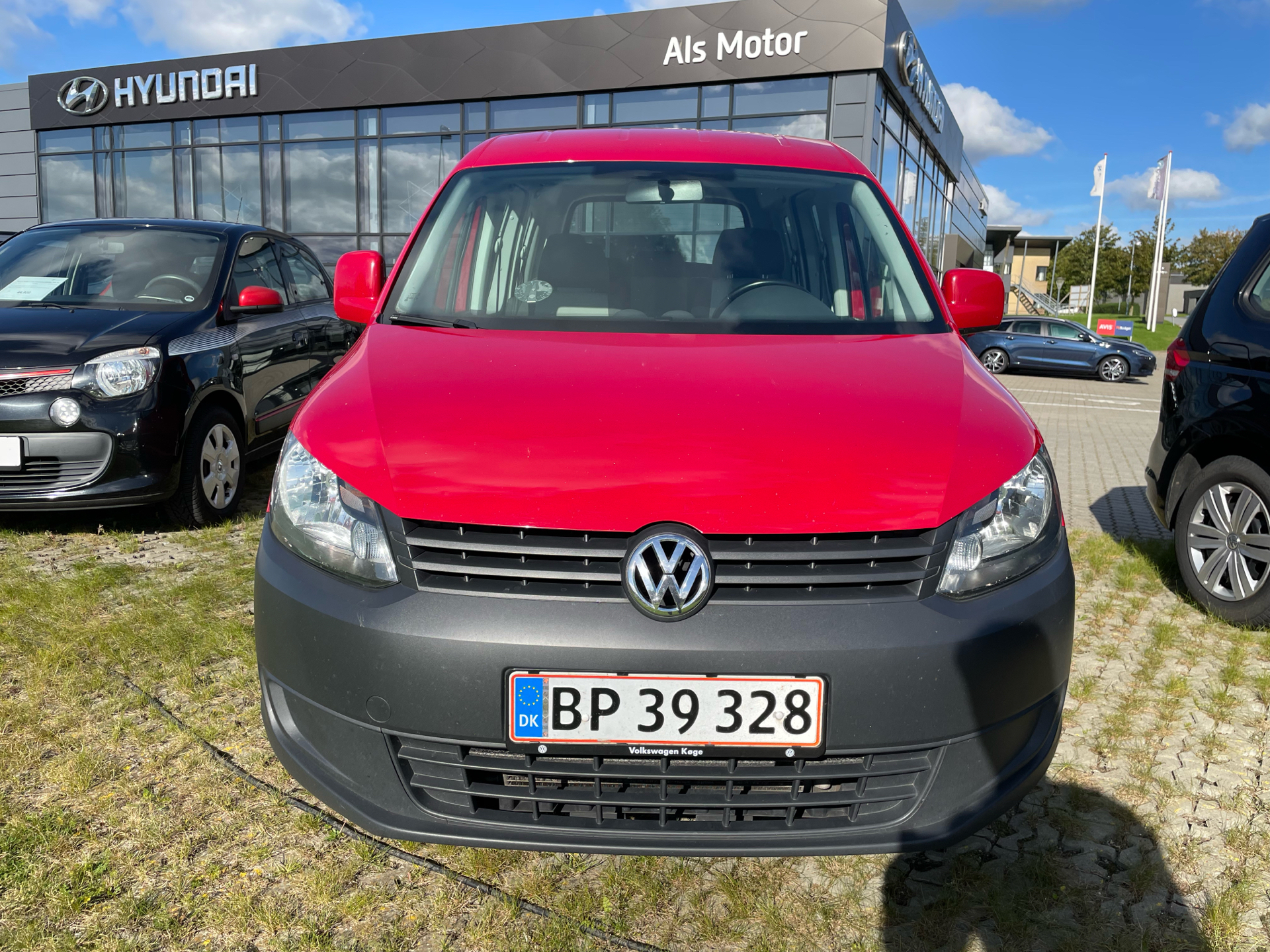 Rød VW Caddy fra 2014