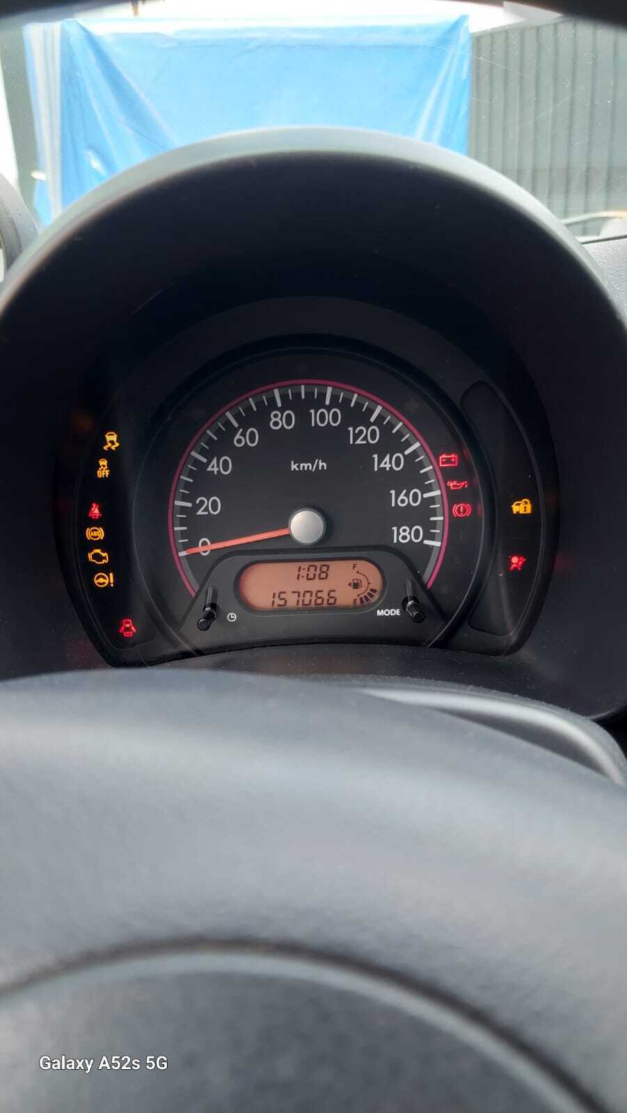 Grå Suzuki Alto fra 2012