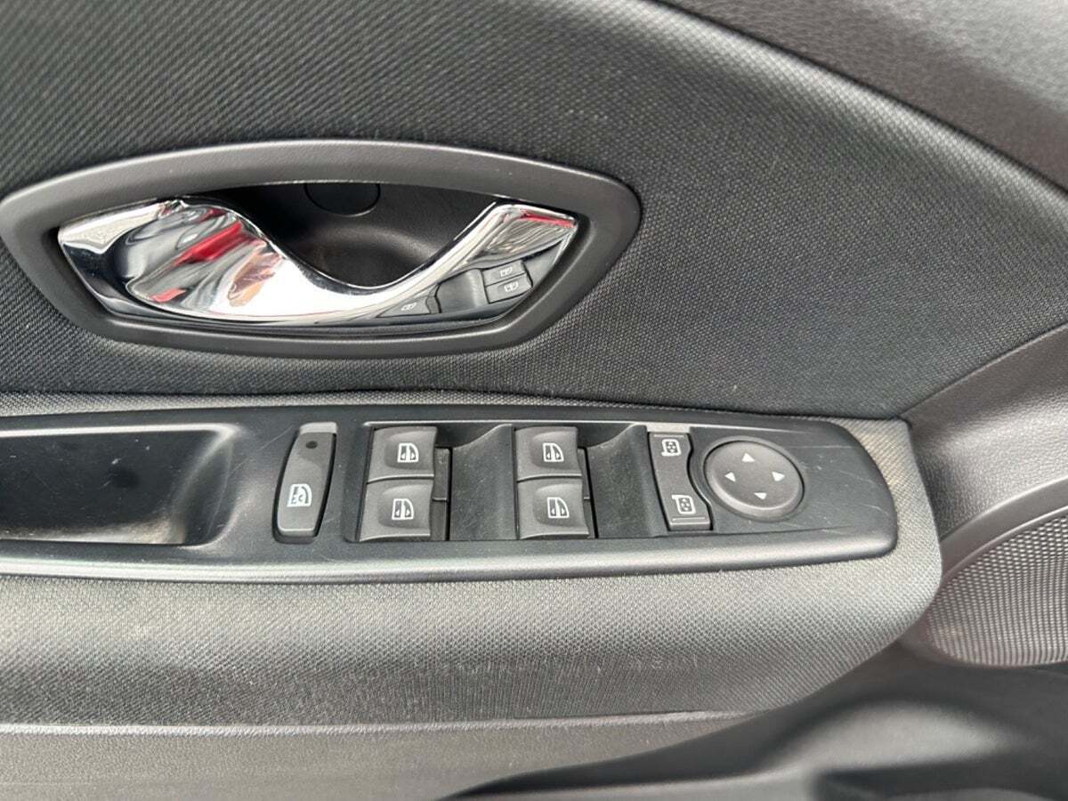 Rød Renault Megane III fra 2013