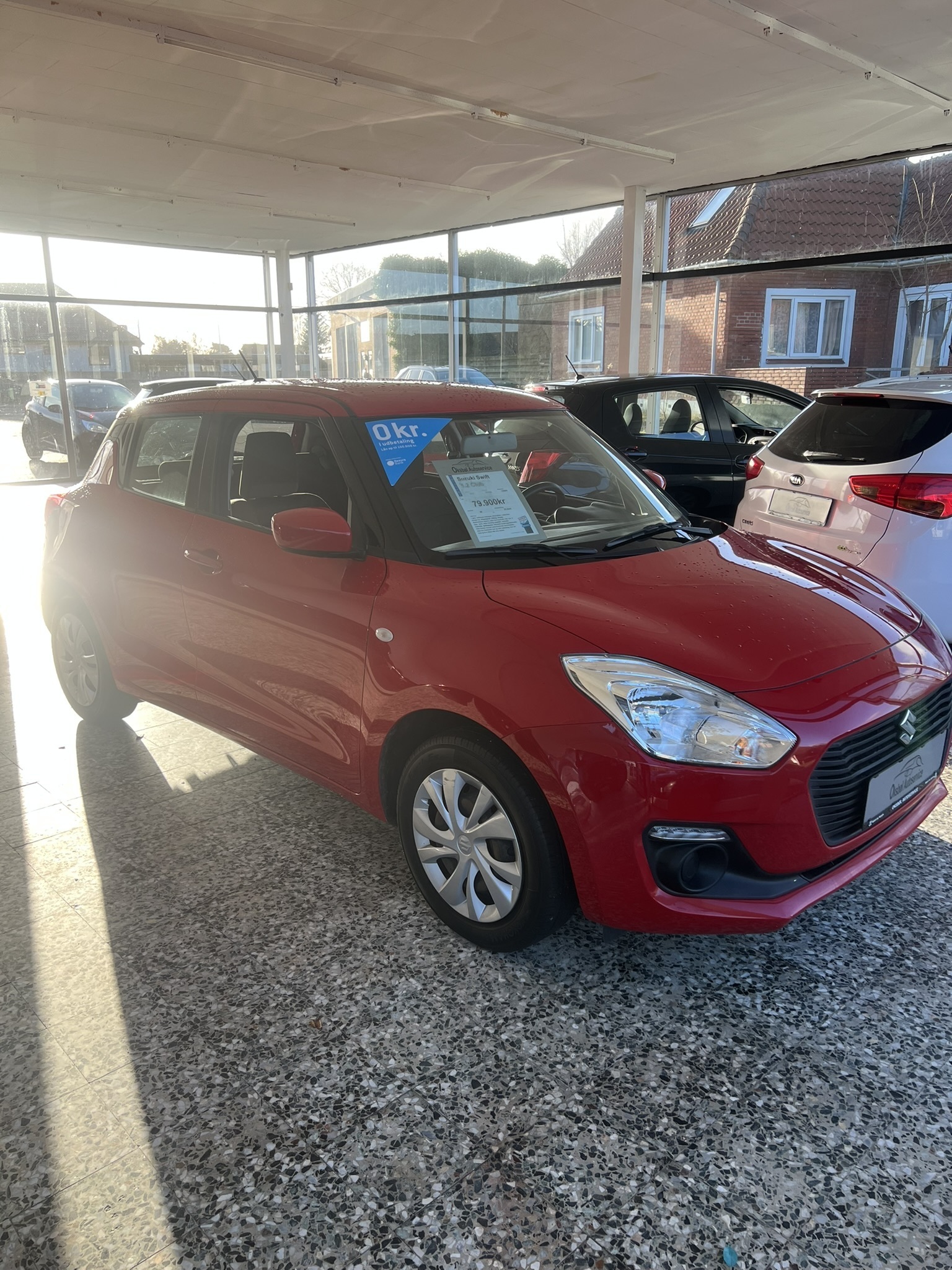 Rød Suzuki Swift fra 2017