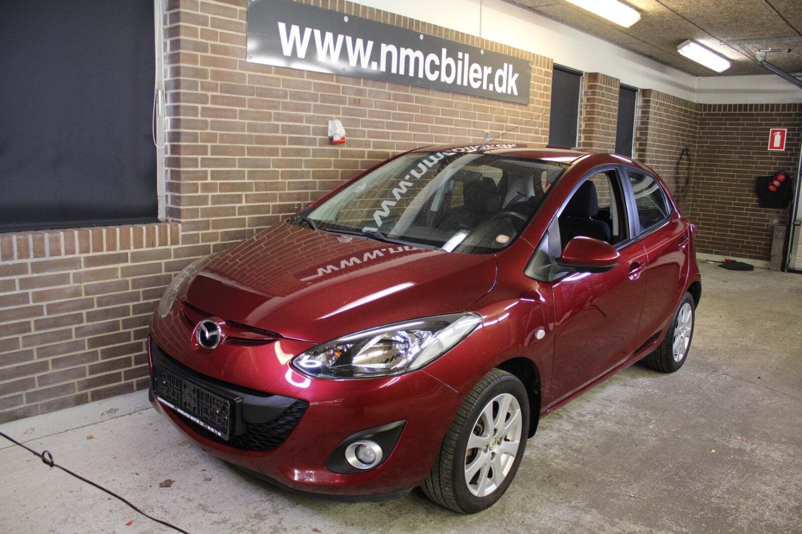 Rød Mazda 2 fra 2012