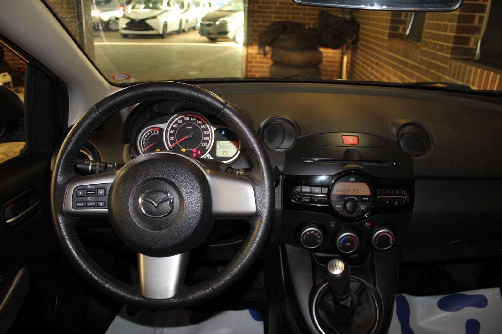 Rød Mazda 2 fra 2012